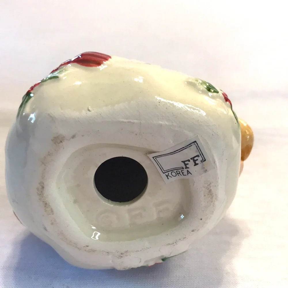Vintage Fitz and Floyd ceramic Christmas shaker decor.